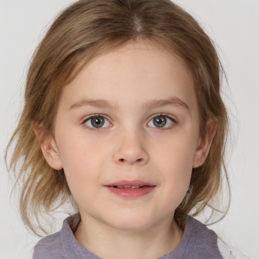 Joyful white child female with medium  brown hair and brown eyes