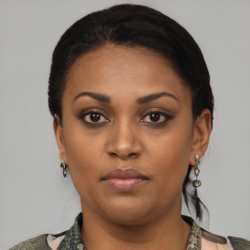 Neutral black young-adult female with short  black hair and brown eyes
