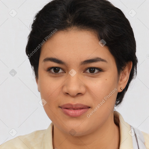 Joyful latino young-adult female with medium  brown hair and brown eyes