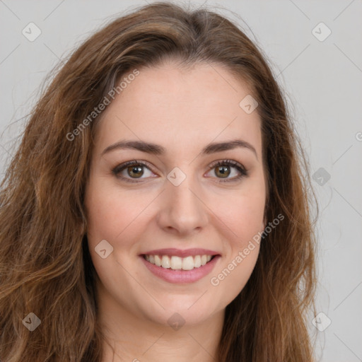 Joyful white young-adult female with long  brown hair and green eyes