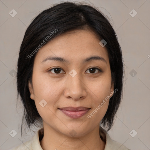 Joyful asian young-adult female with medium  brown hair and brown eyes