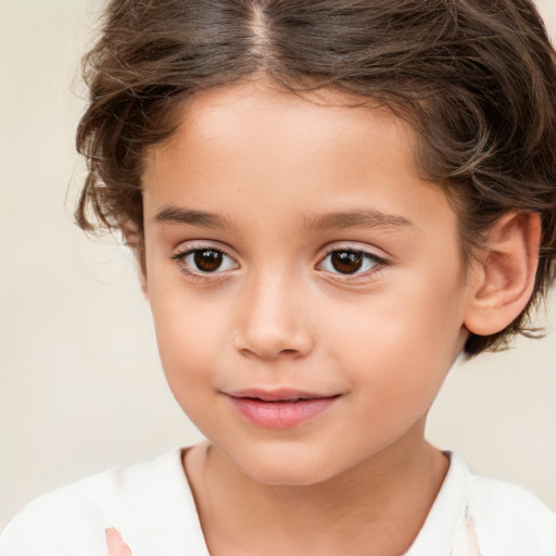 Joyful white child female with medium  brown hair and brown eyes