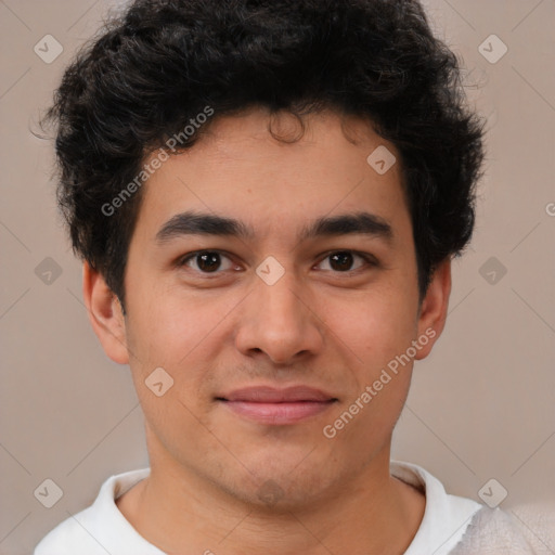 Joyful latino young-adult male with short  brown hair and brown eyes