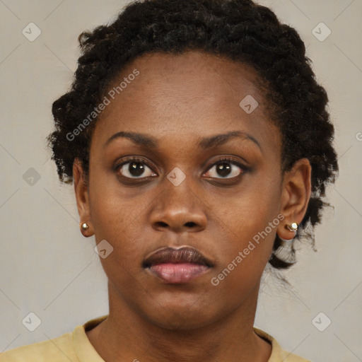 Neutral black young-adult female with short  brown hair and brown eyes