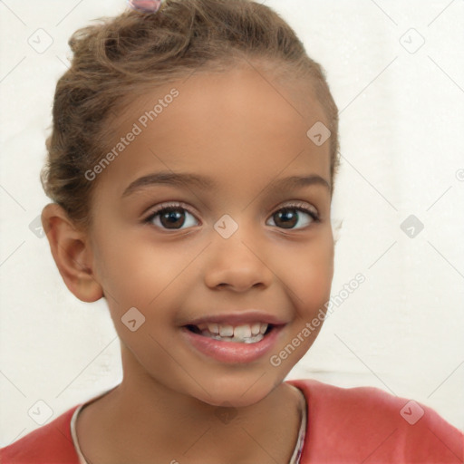 Joyful white child female with short  brown hair and brown eyes