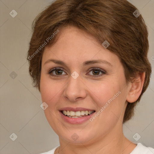 Joyful white young-adult female with medium  brown hair and green eyes