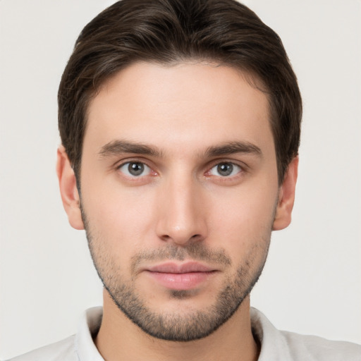 Neutral white young-adult male with short  brown hair and brown eyes