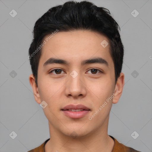 Joyful white young-adult male with short  black hair and brown eyes