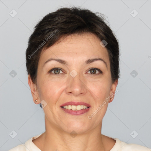 Joyful white adult female with short  brown hair and brown eyes