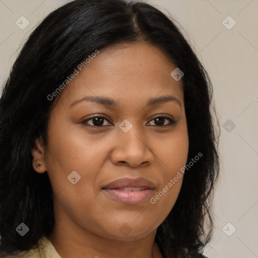 Joyful latino young-adult female with long  brown hair and brown eyes