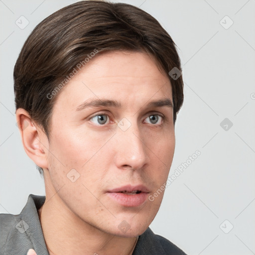 Neutral white young-adult male with short  brown hair and grey eyes