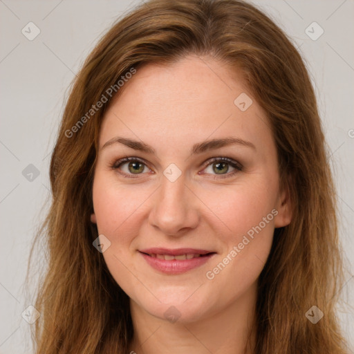 Joyful white young-adult female with long  brown hair and green eyes