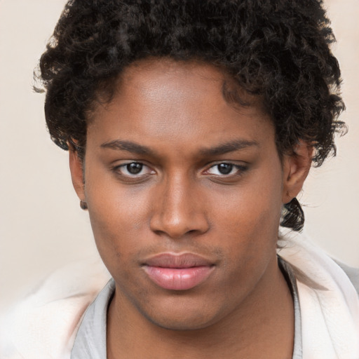 Neutral black young-adult female with short  brown hair and brown eyes