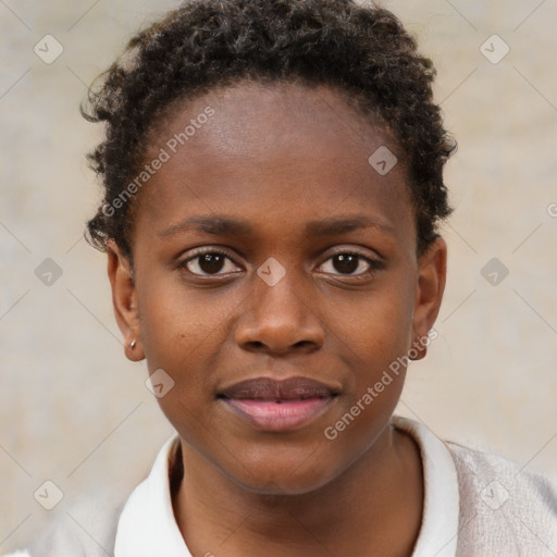 Joyful black child female with short  brown hair and brown eyes
