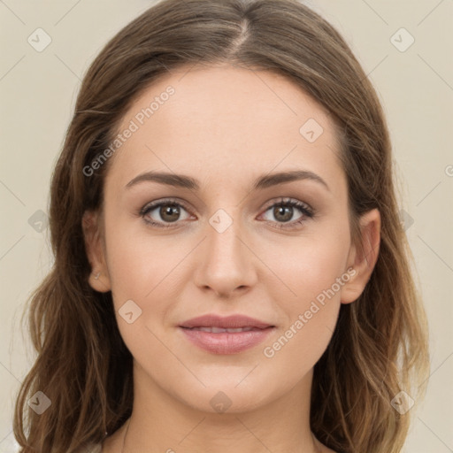 Joyful white young-adult female with long  brown hair and green eyes