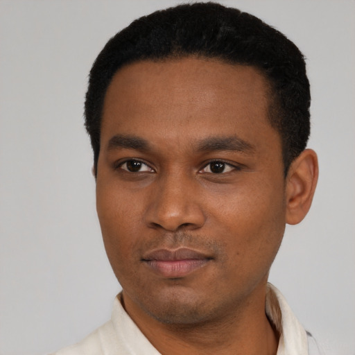 Neutral black young-adult male with short  black hair and brown eyes
