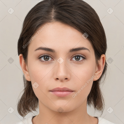 Neutral white young-adult female with medium  brown hair and brown eyes