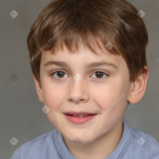 Joyful white child male with short  brown hair and brown eyes