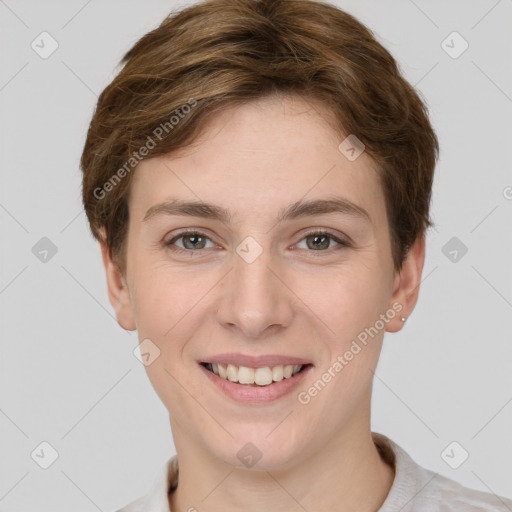 Joyful white young-adult female with short  brown hair and grey eyes