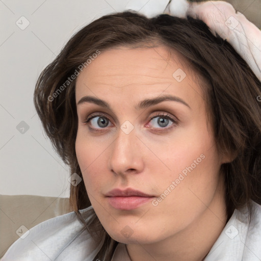 Neutral white young-adult female with medium  brown hair and brown eyes