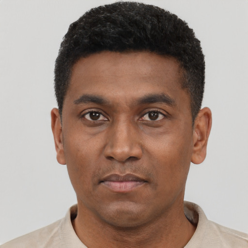 Neutral latino young-adult male with short  black hair and brown eyes