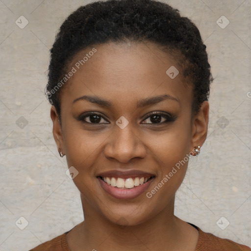 Joyful black young-adult female with short  brown hair and brown eyes