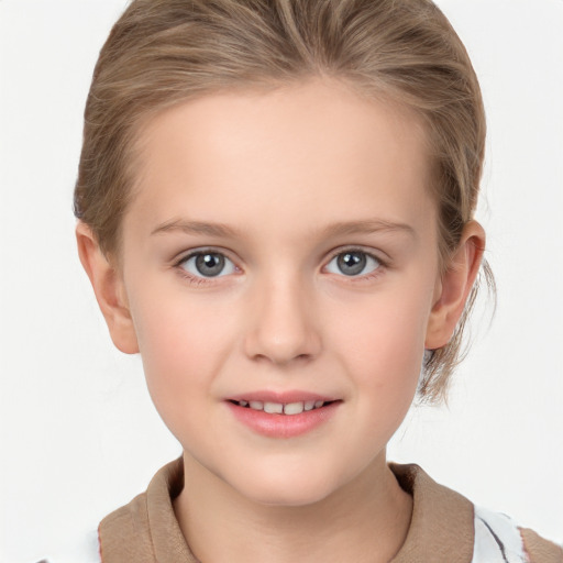 Joyful white child female with medium  brown hair and grey eyes