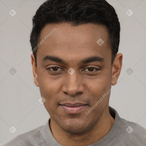 Joyful latino young-adult male with short  black hair and brown eyes