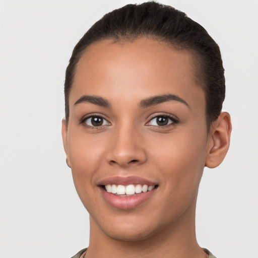 Joyful white young-adult female with short  brown hair and brown eyes