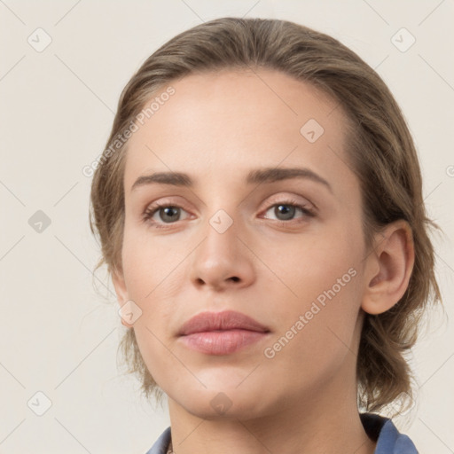 Neutral white young-adult female with medium  brown hair and grey eyes