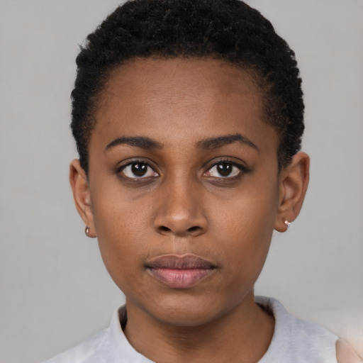 Neutral black young-adult female with short  black hair and brown eyes