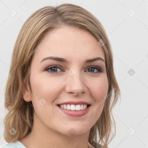 Joyful white young-adult female with medium  brown hair and green eyes