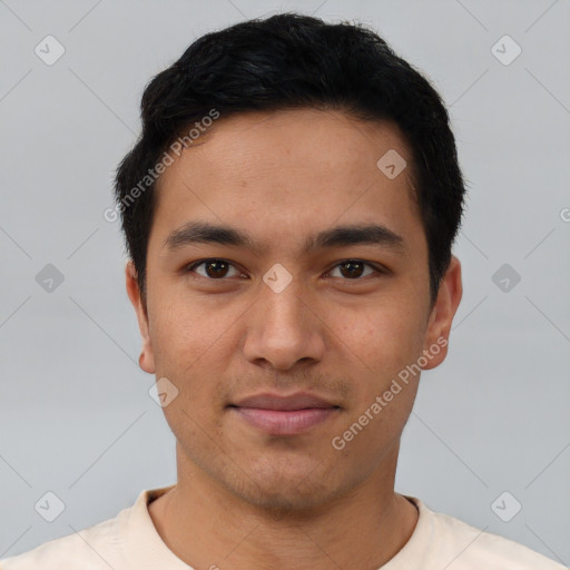 Joyful asian young-adult male with short  black hair and brown eyes