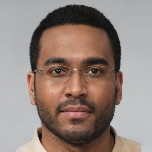 Neutral black young-adult male with short  black hair and brown eyes