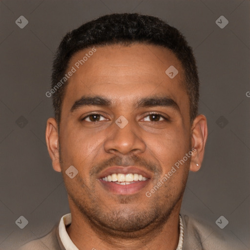 Joyful black young-adult male with short  brown hair and brown eyes