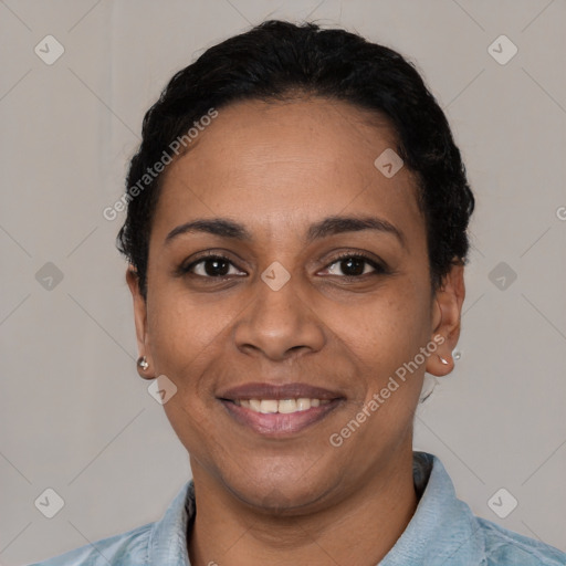 Joyful latino young-adult female with short  black hair and brown eyes