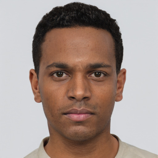 Neutral black young-adult male with short  black hair and brown eyes
