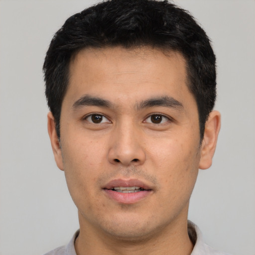 Neutral white young-adult male with short  black hair and brown eyes