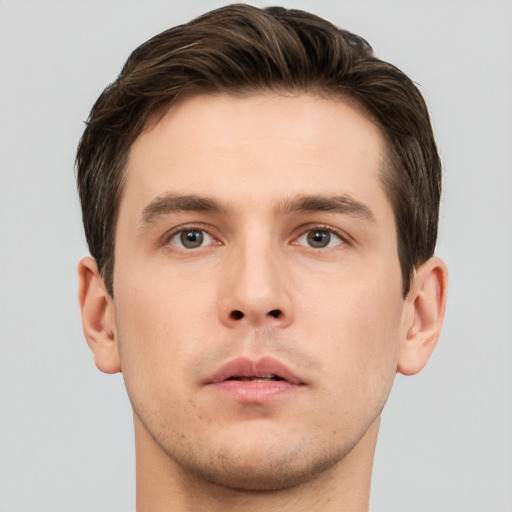 Neutral white young-adult male with short  brown hair and brown eyes