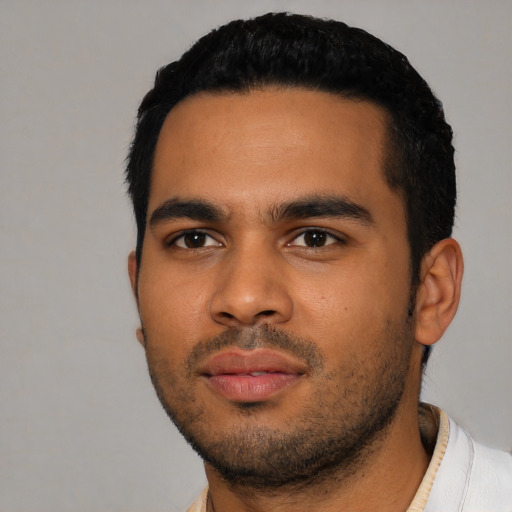 Neutral latino young-adult male with short  black hair and brown eyes