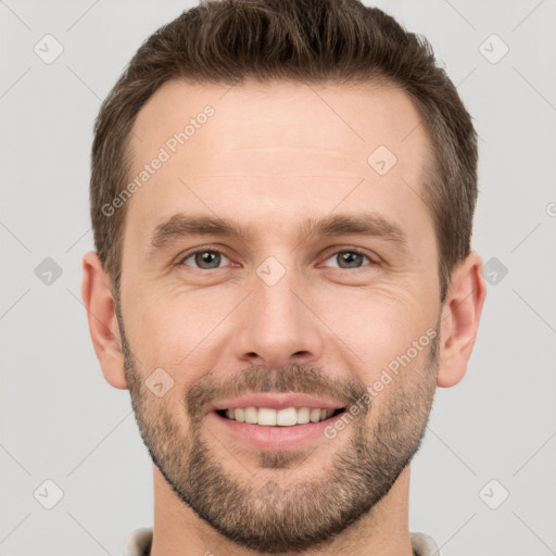 Joyful white young-adult male with short  brown hair and brown eyes