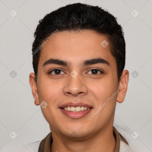 Joyful latino young-adult male with short  brown hair and brown eyes