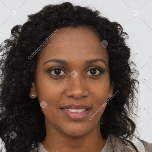 Joyful black young-adult female with long  brown hair and brown eyes