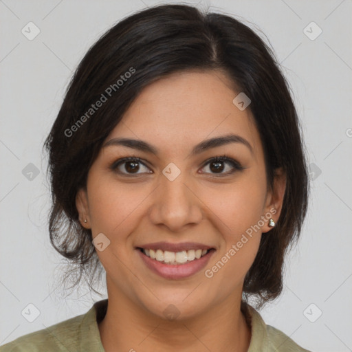 Joyful latino young-adult female with medium  brown hair and brown eyes