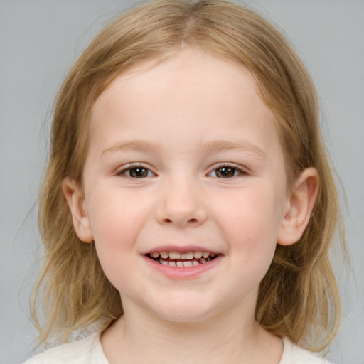 Joyful white child female with medium  brown hair and brown eyes