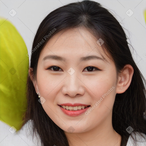 Joyful asian young-adult female with medium  brown hair and brown eyes