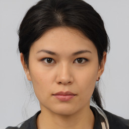 Neutral asian young-adult female with medium  brown hair and brown eyes