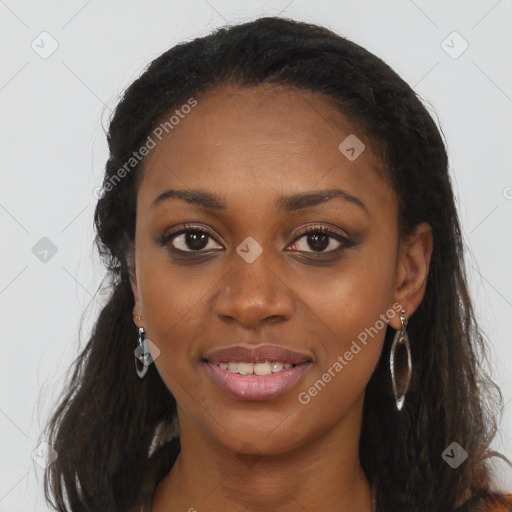 Joyful black young-adult female with long  brown hair and brown eyes