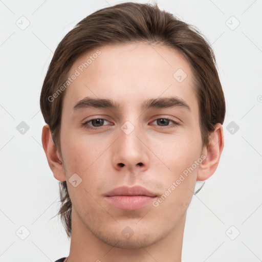 Neutral white young-adult male with short  brown hair and brown eyes