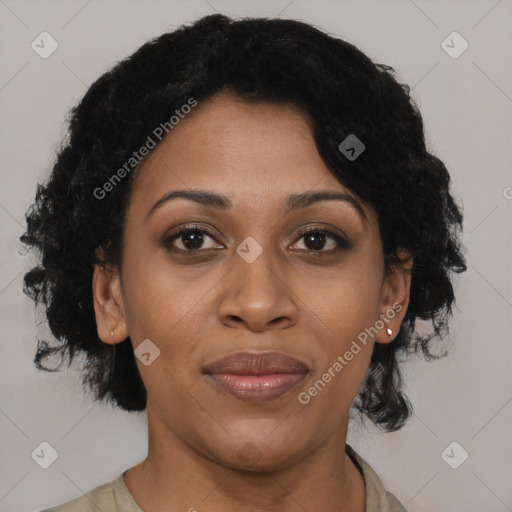 Joyful black adult female with short  black hair and brown eyes
